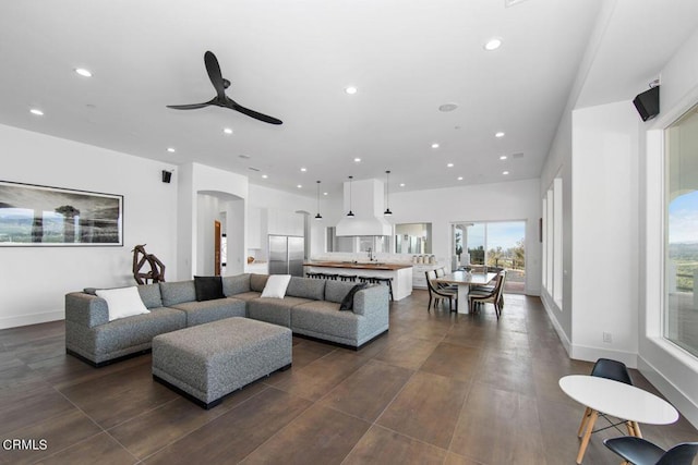 living room with ceiling fan