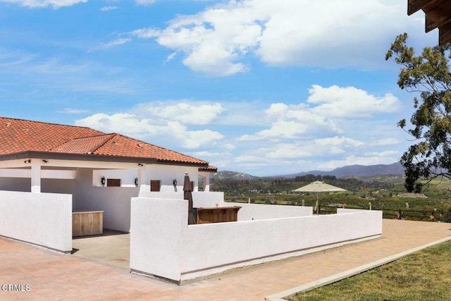 view of patio featuring a mountain view