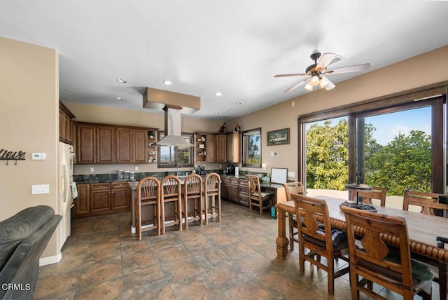 dining space with ceiling fan