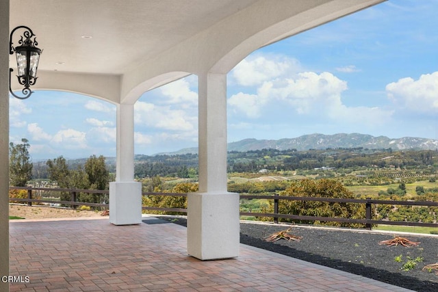 view of patio with a mountain view