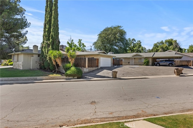 ranch-style home with a garage