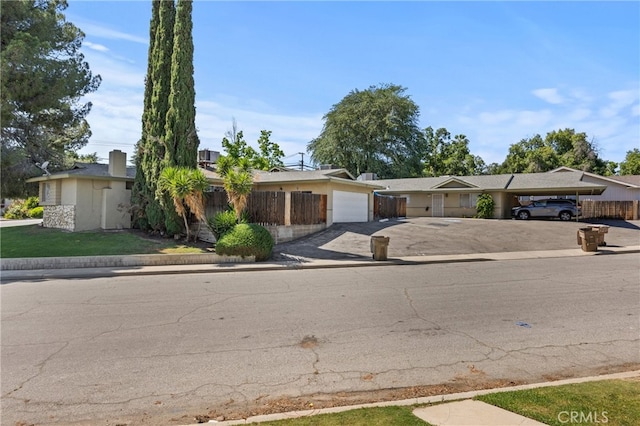 view of front of house with a garage and driveway