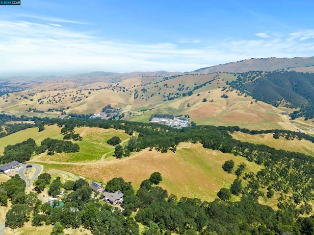 drone / aerial view featuring a mountain view