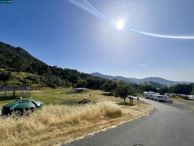 property view of mountains with a rural view