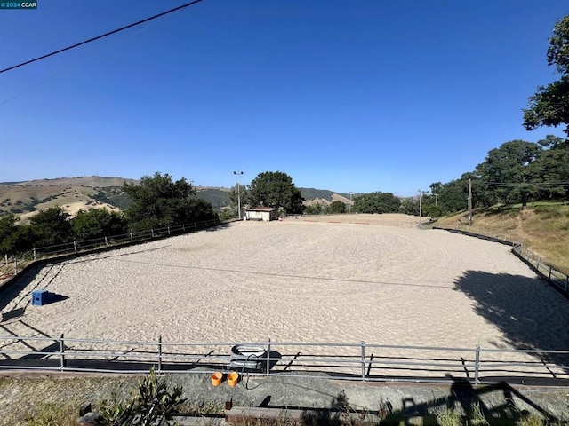 surrounding community featuring a mountain view and a rural view