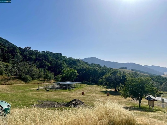 property view of mountains featuring a rural view