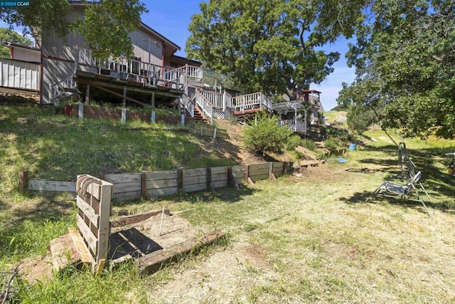 view of yard featuring a wooden deck