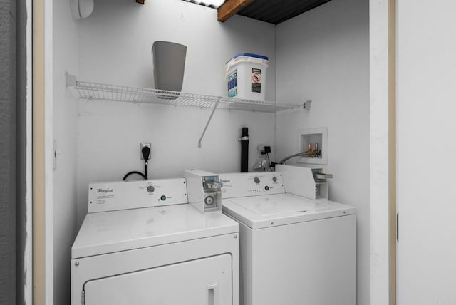 washroom featuring washer and dryer