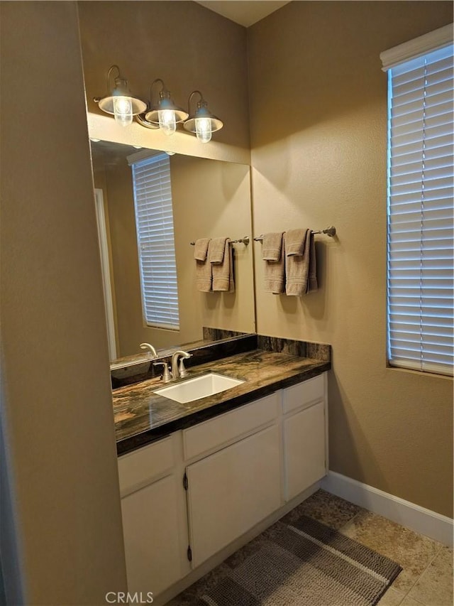 bathroom featuring vanity and tile patterned floors