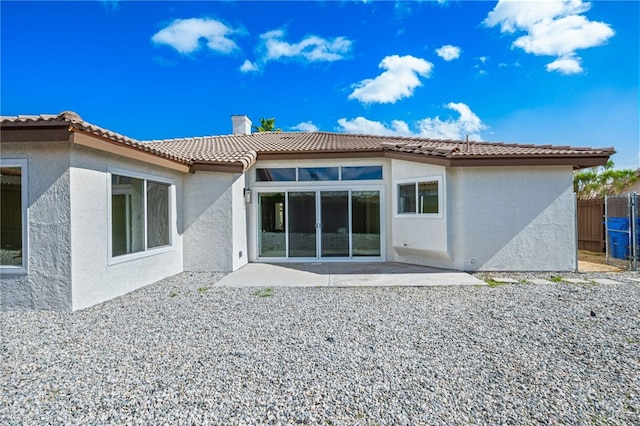 rear view of property with a patio area