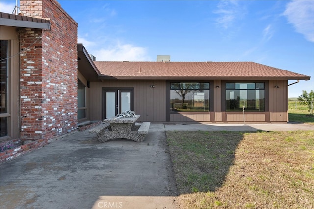 exterior space featuring a patio and a yard