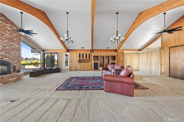 living room featuring carpet flooring, a brick fireplace, and brick wall