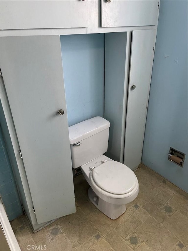 bathroom featuring toilet