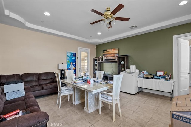 tiled dining room with ceiling fan