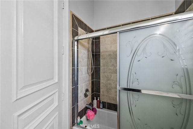 bathroom featuring enclosed tub / shower combo