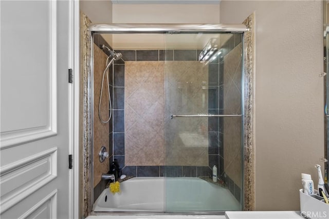 bathroom featuring enclosed tub / shower combo