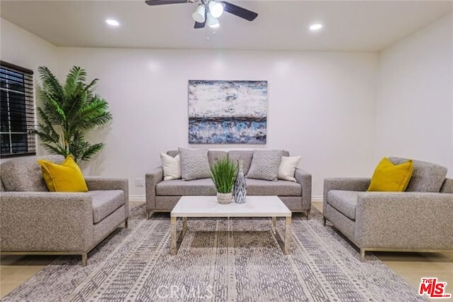 living room featuring ceiling fan