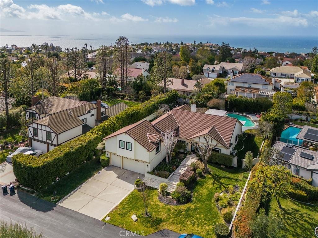 aerial view featuring a water view