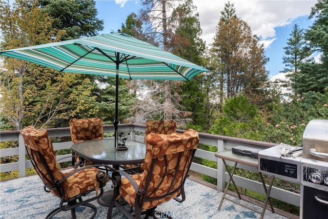 view of patio featuring grilling area and outdoor dining space