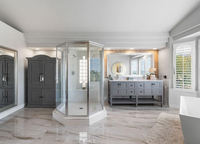 bathroom with vanity and independent shower and bath