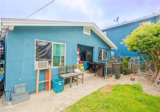 rear view of property with a patio