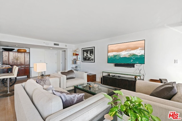 living room with hardwood / wood-style floors