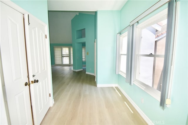 hallway with light wood-type flooring