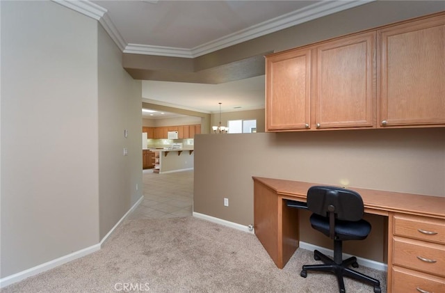 unfurnished office featuring light carpet, ornamental molding, and a notable chandelier