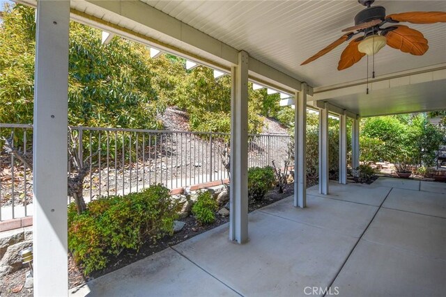 view of patio featuring ceiling fan