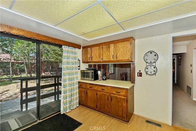 kitchen with light hardwood / wood-style floors