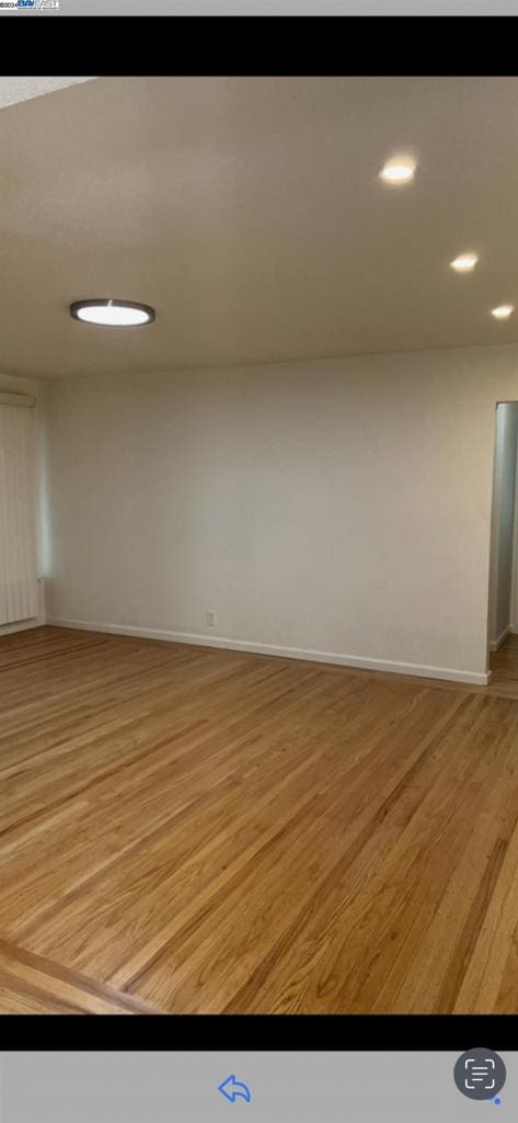 empty room with light wood-type flooring