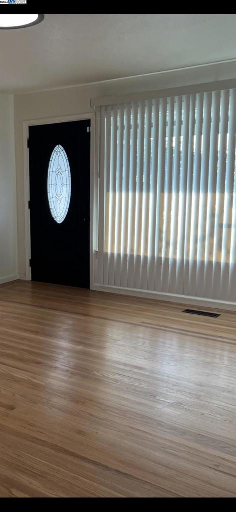 foyer featuring hardwood / wood-style flooring