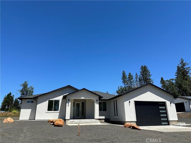 ranch-style home with a garage