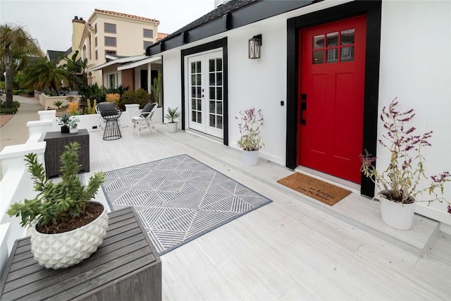 doorway to property featuring french doors