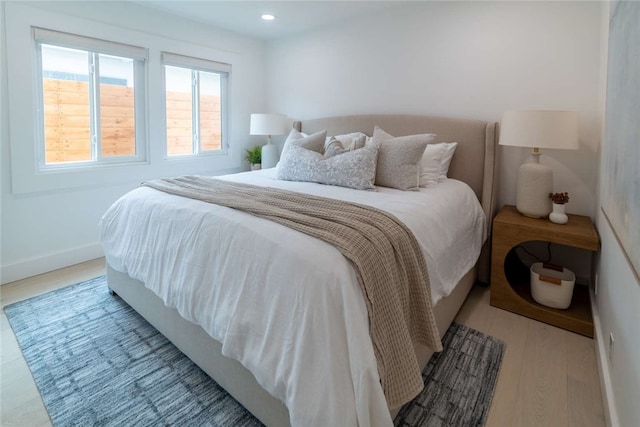 bedroom featuring light hardwood / wood-style floors