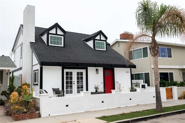 back of property featuring french doors