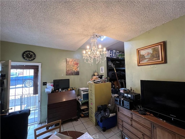 interior space with a textured ceiling and a notable chandelier