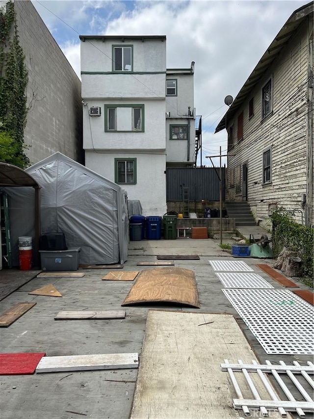 rear view of house with a patio area