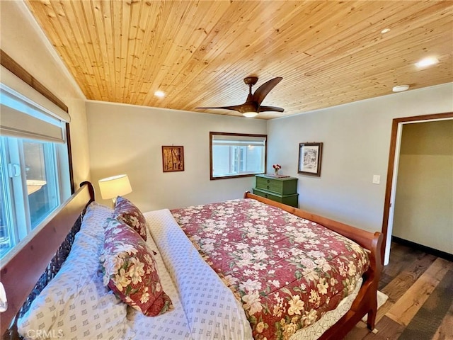 bedroom with ceiling fan, wood-type flooring, crown molding, and wooden ceiling