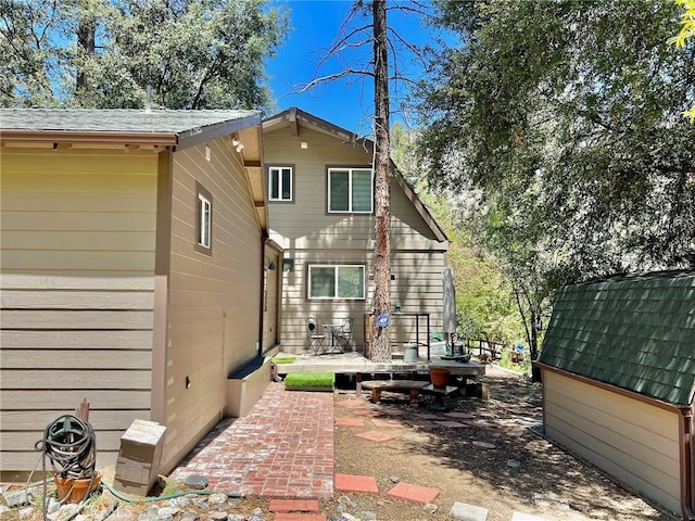 back of house featuring a patio area