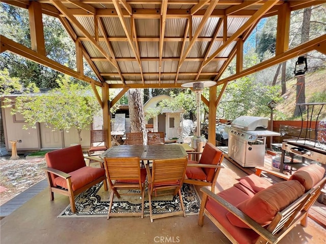 view of patio / terrace with grilling area and an outdoor living space