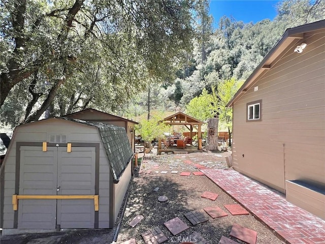 view of patio / terrace with a storage shed