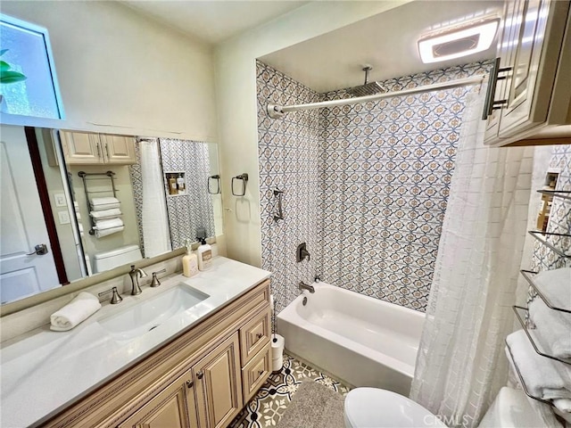 full bathroom featuring toilet, shower / tub combo, vanity, and tile patterned floors