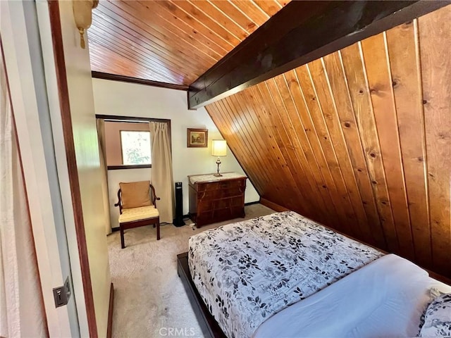 bedroom featuring carpet, wooden ceiling, vaulted ceiling, and ornamental molding