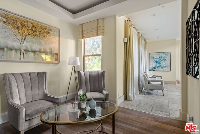 sitting room featuring hardwood / wood-style flooring