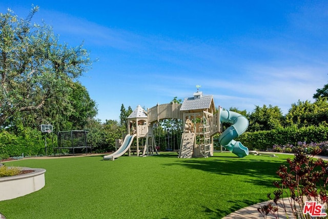 view of jungle gym featuring a yard