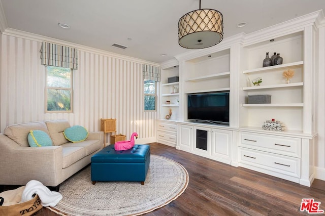 living room with crown molding, dark hardwood / wood-style floors, and a healthy amount of sunlight