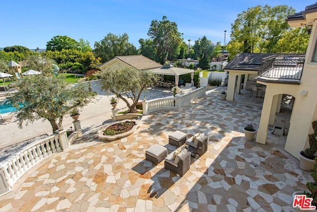 view of patio with a pool