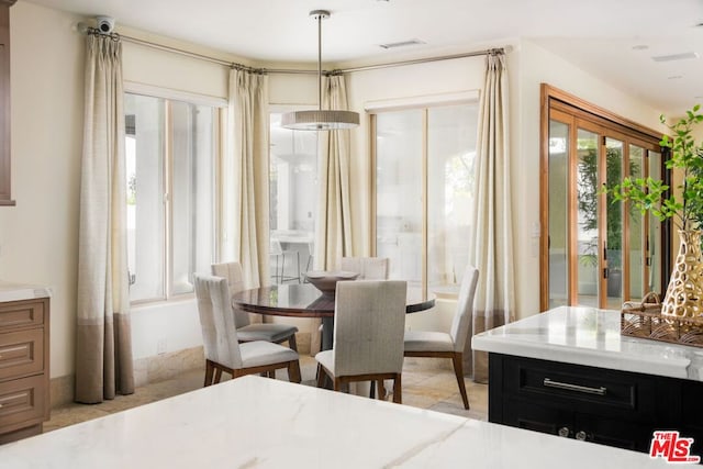 dining room with light tile patterned floors