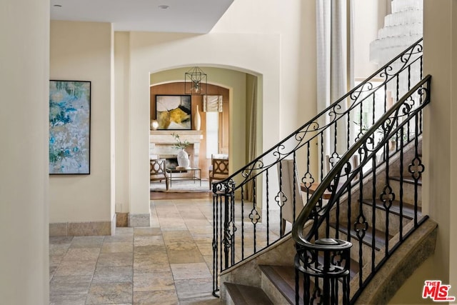 staircase with tile patterned flooring